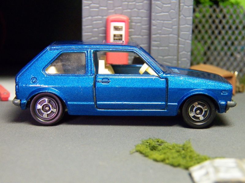 Illustration for article titled Tomica 1:56 VW Golf GLE "Goes Like... Excellent?"